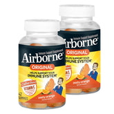 Airborne Gommes orange, bouteille visible, prise quotidienne pratique.