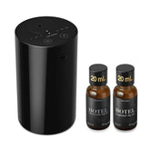 Airversa AN8Kit-3 diffuseur noir sans eau, installation facile dans salon.