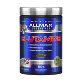 ALLMAX Glutamine dans un verre-shake: poudre facile à mélanger pour récupération après l'entraînement.