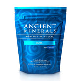 Flocons de bain Ancient Minerals Ultra pour une détente après l'effort dans l'eau chaude.