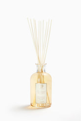 Diffuseur Antica Farmacista avec bouteille et tiges, parfum durable pour salon.