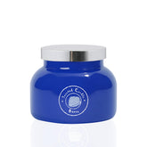 Bougie Aroma Bay Ozone dans un verre bleu, ambiance maritime et frais, pour rafraîchir une pièce.