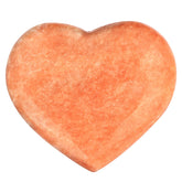 artistone cœur cristal orange calcite poli, parfait pour la détente et l'équilibre du chakra cœur.