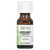 Huile essentielle de bergamote Aura Cacia dans une bouteille, ambiance rafraîchissante et revitalisante.