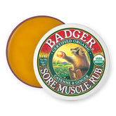 Baume Badger pour les muscles, pot prêt à l’emploi après l’entraînement.