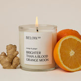Below 60 Bougie orange-gingembre pour une ambiance énergisante.
