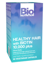 Bio Nutrition Biotine Vegi-Caps: bouteille visible et gélules, soutien potentiel à la routine capillaire.