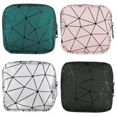 Pochette Bisanzoya de rangement pour protections hygiéniques – ensemble quatre pièces, discrétion garantie.