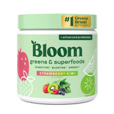 Bloom Nutrition Poudre verdure et superaliments dans un verre prêt au mélange.