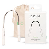 Grattoir de langue Boka en acier inoxydable avec étui en lin, pour une hygiène durable.