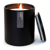 Calyan Wax Co. Oakmoss & Ambre: bougie noire longue durée pour salon élégant