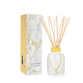 Diffuseur Capri Blue marbre moderne avec bouteille en verre, pour une ambiance sophistiquée.