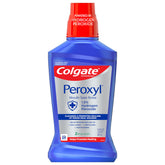 Colgate Peroxyl flacon 500 ml, rinçage antiseptique sans alcool pour irritations mineures.