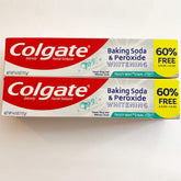 Colgate: tube blanchiment bicarbonate et peroxyde, fraîcheur menthe givrée.