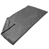Housse CooCoCo velours cristal gris sur coussin chauffant, confort et durabilité.