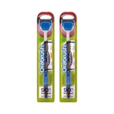 DenTek Orabrush : brins ultra-doux nettoyant la langue en douceur.