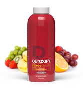 Detoxify Ready Clean Tropical – Bouteille 473 ml prête pour votre routine bien-être.
