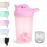 Bouteille shaker D.Y.A rose ouverte, idéale pour mélanger protéines et smoothies.
