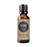 Edens Garden Vetiver huile essentielle en bouteille montrant l’étiquette et le confinement pour le soin et la diffusion.