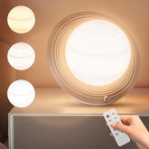 Lampe FARRIDE avec design Saturne pour une ambiance élégante et apaisante.