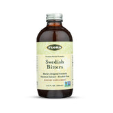 Flora Swedish Bitters – bouteille en verre, présentation premium et naturelle pour la digestion.