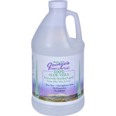 Georges Aloe Vera Drink : bouteille versée, hydratation naturelle.