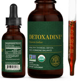 Detoxadine Global Healing Center: bouteille prête à un usage quotidien avec gouttes.