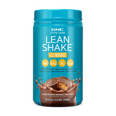 GNC Total Lean en bouteille avec shake chocolat-beurre de cacahuète, pratique pour le déjeuner.