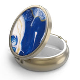Boîte à pilules Hion ronde avec miroir et finition bronze pour le voyage