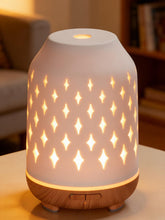 InnoGear diffuseur en céramique 150 ml avec lumière douce pour ambiance reposante.