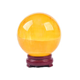 Boule fluorite jaune JIC Gem 90-100 mm sur socle bois, idéale pour exposition.