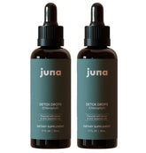 Gouttes Juna chlorophylle dans une bouteille fraîche et lumineuse.