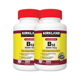 Kirkland B-12 5000 mcg, bouteille cerise, comprimés sublinguaux, énergie soutenue.