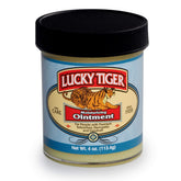 Pommade hydratante Lucky Tiger dans un pot, action nourrissante pour peau sèche et irritée.