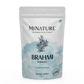 Minature Brahmi biologique — poudre verte fraîche prête pour les soins capillaires naturels.