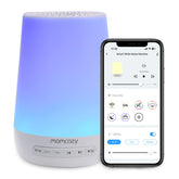Momcozy machine à bruits pour bébé avec lumière nocturne bleu — ambiance rassurante au coucher.
