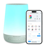 Momcozy machine bruit blanc pour bébé avec veilleuse verte, crée un cadre calme.