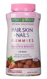 Nature's Bounty gommes fraise pour cheveux peau et ongles, soutien beauté naturel.