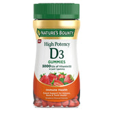 Nature's Bounty vitamine D3 gommes dans une bouteille visible à la fraise, soutien immunitaire potentiel.