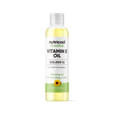 Nutricost Huile vitamine E - bouteille prête pour nourrir la peau en profondeur.