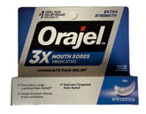 Orajel tube prêt à ouvrir pour un accès rapide au soulagement buccal.