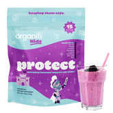 Organifi Protect pour enfants — poudre immunitaire prête à mélanger dans une boisson fruits rouges.