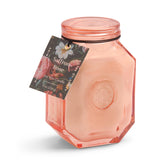 Bougie Paddywax Botanica dans verre embossé, parfum safran-rose pour ambiance élégante et durable.