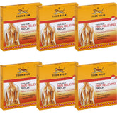 Pansement Tiger Balm appliqué sur épaule pour soulagement ciblé.