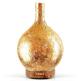 Porseme diffuseur en verre doré 150 ml, ambiance aromatique élégante dans le salon.