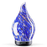 Diffuseur Porseme en verre bleu profond pour une ambiance calme.