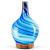 Porseme diffuseur en verre 150 ml, boule artisanale, ambiance apaisante dans la chambre.