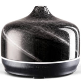 Porseme diffuseur en verre 500ml avec ambiance chaleureuse et aromathérapie subtile.