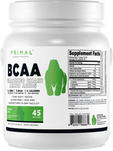 Poudre Primal BCAA Grand Singe au goût pomme verte, flacon prêt à mélanger.