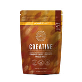 Poudre créatine Primal Harvest dans un verre d'eau, soutien potentiel à l'endurance et récupération.
